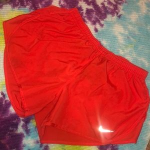 Orange Nike shorts